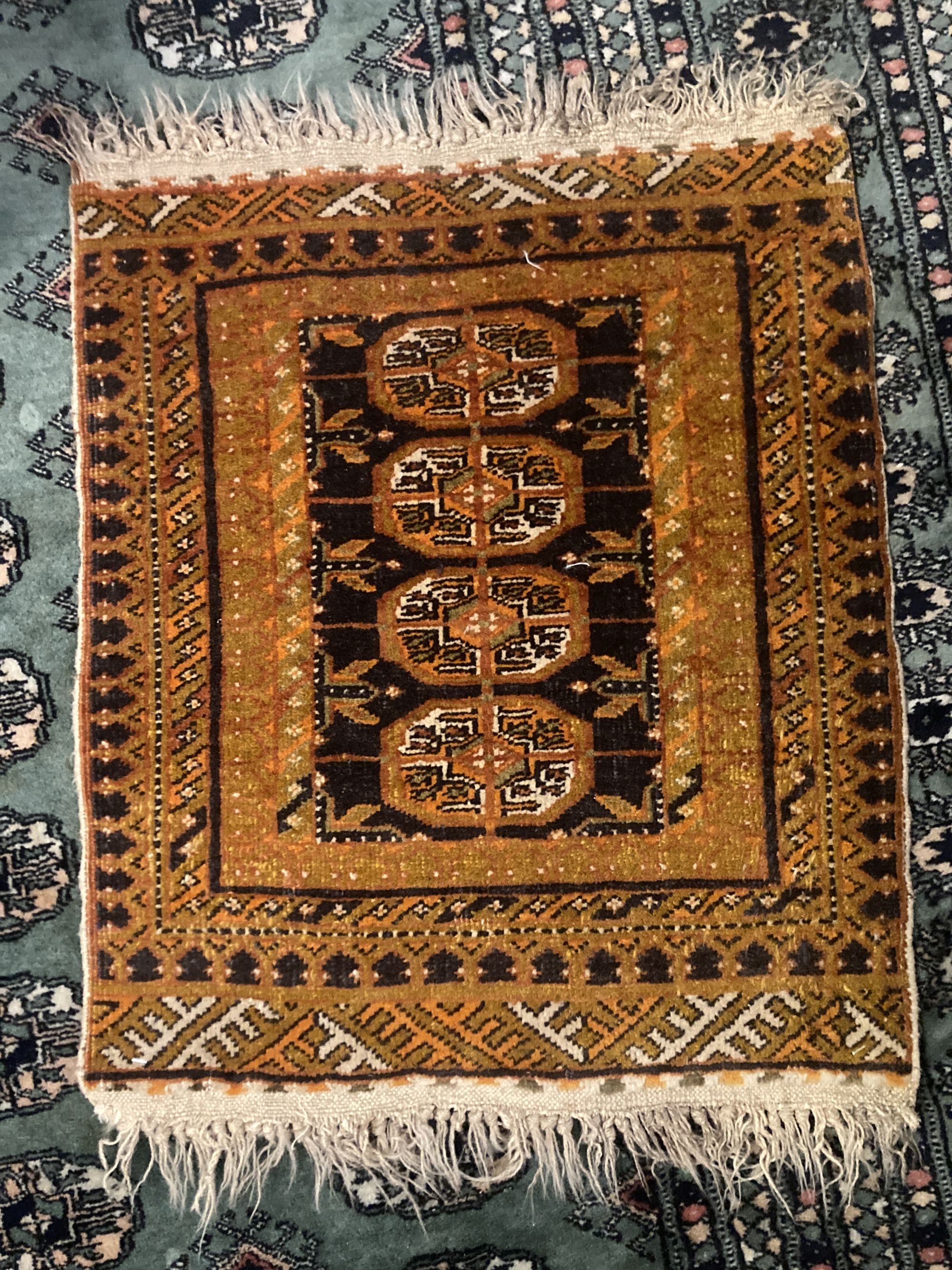 Ten Caucasian, Bokhara and North West Persian prayer mats and rugs and a Chinese mat, largest 150 x 96cm